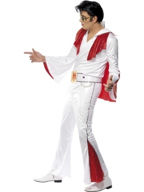 Elvis Kostuum in de kleur wit met rood. Het complete Elvis kostuum voor heren bestaande uit de broek, shirt, cape en de riem. Ook in het zwart/rood verkrijgbaar.