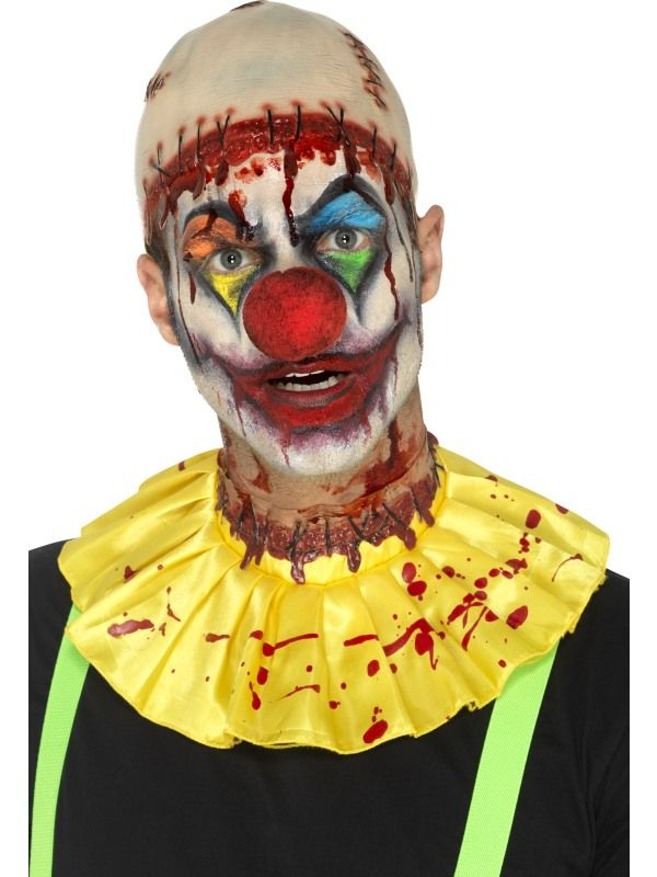 Latex Creepy Clown Instant Kit, bestaande uit de gele kraag, de kale hoofdcap en doorgesneden keel wond. Bekijk hier onze Creepy Clown Kostuums.