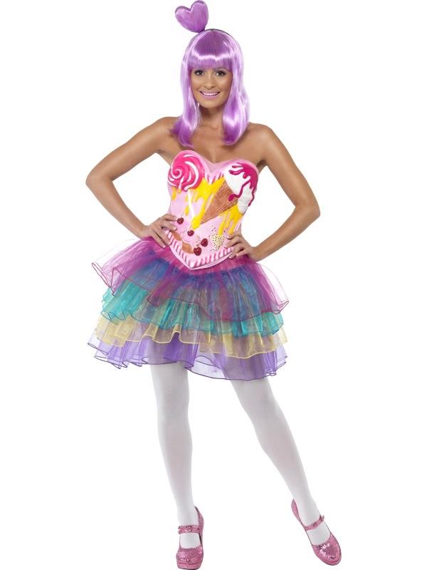 Candy Queen Katy Perry Dames Verkleedkleding. Candy Queen kostuum bestaande uit een jurk met een strapless roze bovenkant en een tutu rok in verschillende kleuren en een latex bovenstuk met leuke candy opdruk. Het bovenstuk zit niet aan de jurk vast en kan doormiddel van een elastiek om de middel over de jurk gedragen worden.