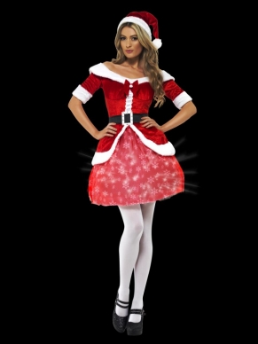 Mooie Sexy Kerstvrouw Kerstman Verkleedkostuum met Lichtjes. Inbegrepen is de mooie jurk met lichtjes in de rok die aan/uit kunnen, de zwarte riem en de kerstmuts. 
